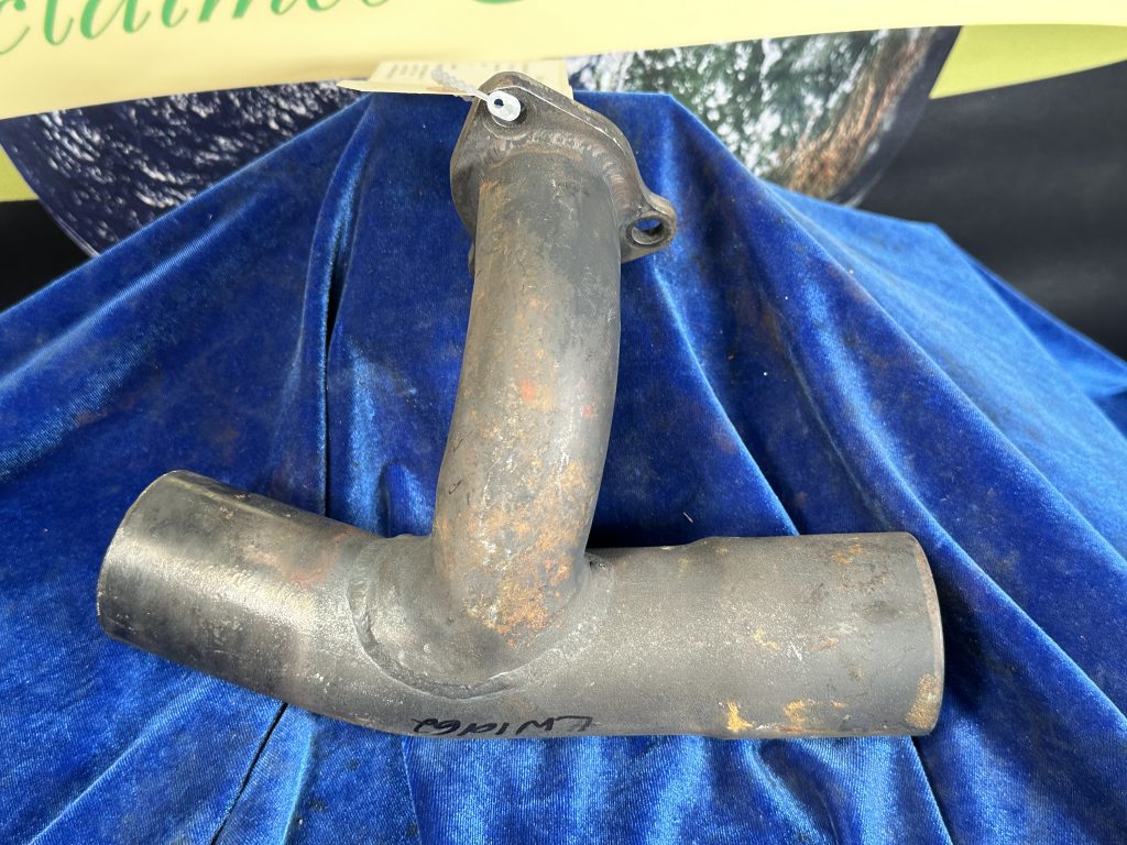 EXHAUST RISER - LH REAR
