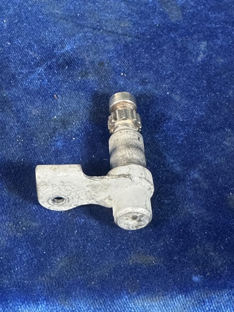 SHAFT - LH DOOR HANDLE