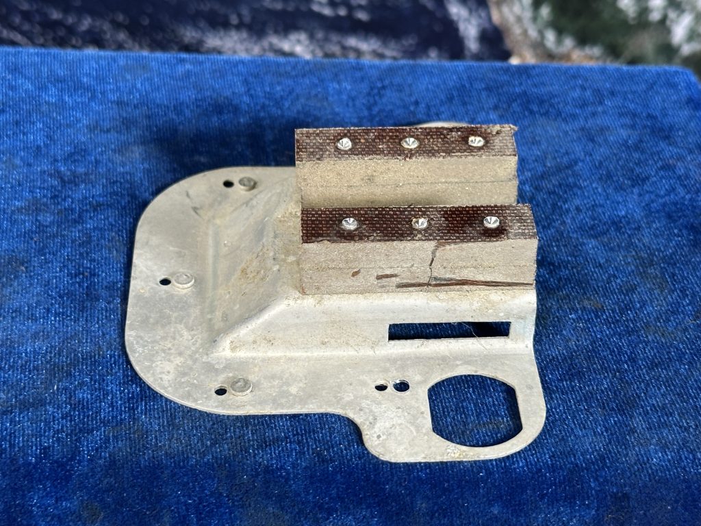 PAN - DOOR LATCH LH + PHENOLIC SPACER