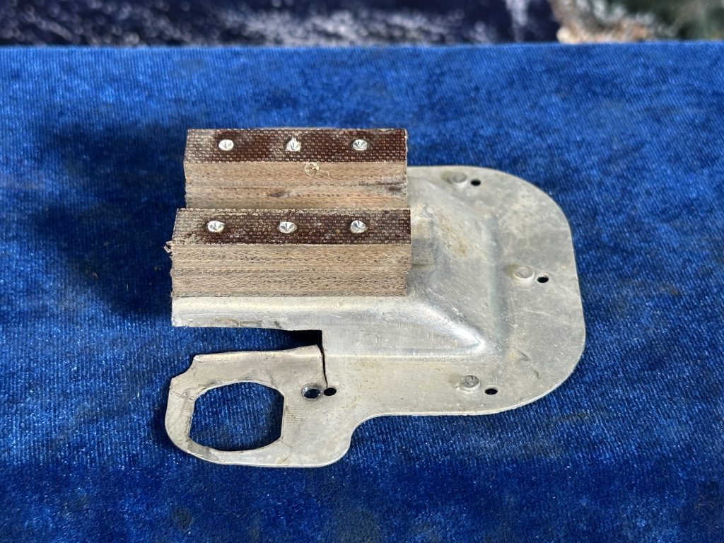 PAN - DOOR LATCH LH + PHENOLIC SPACER