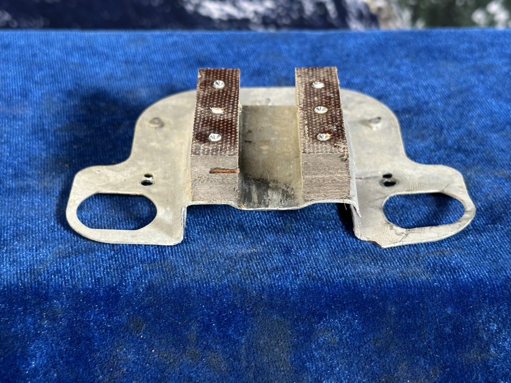 PAN - DOOR LATCH LH + PHENOLIC SPACER