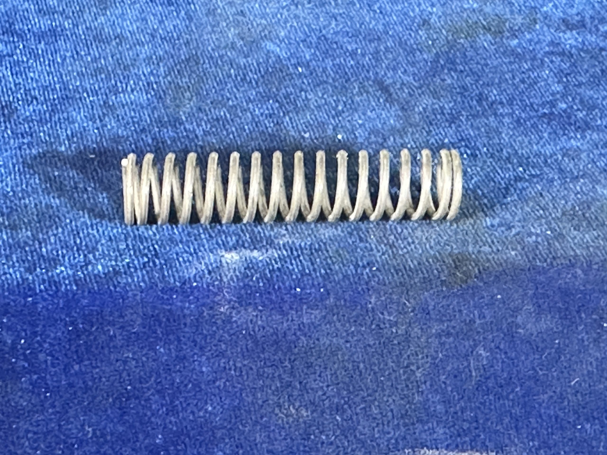 SPRING - FUEL STRAINER